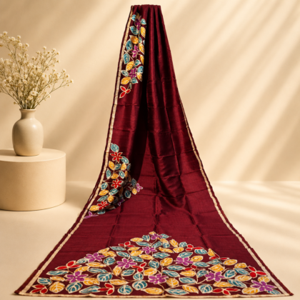 Maroon batik silk saree with multicolour floral motifs