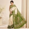 Bishnupuri hand painted silk saree in cream and green with traditional batik motifs