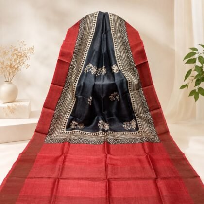 Red black Tussar silk saree with traditional patterned pallu